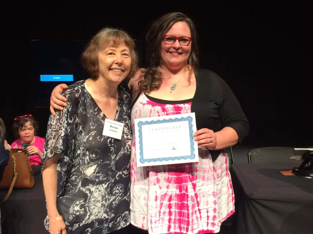 Angie with Marilyn Chadwick after receiving accreditation with the WellSpring Guild, in Cedar Falls, Iowa at the Midwest Institute on Communication and Inclusion at The University of Northern Iowa